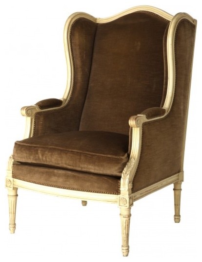 Antique upholstered wing chair
