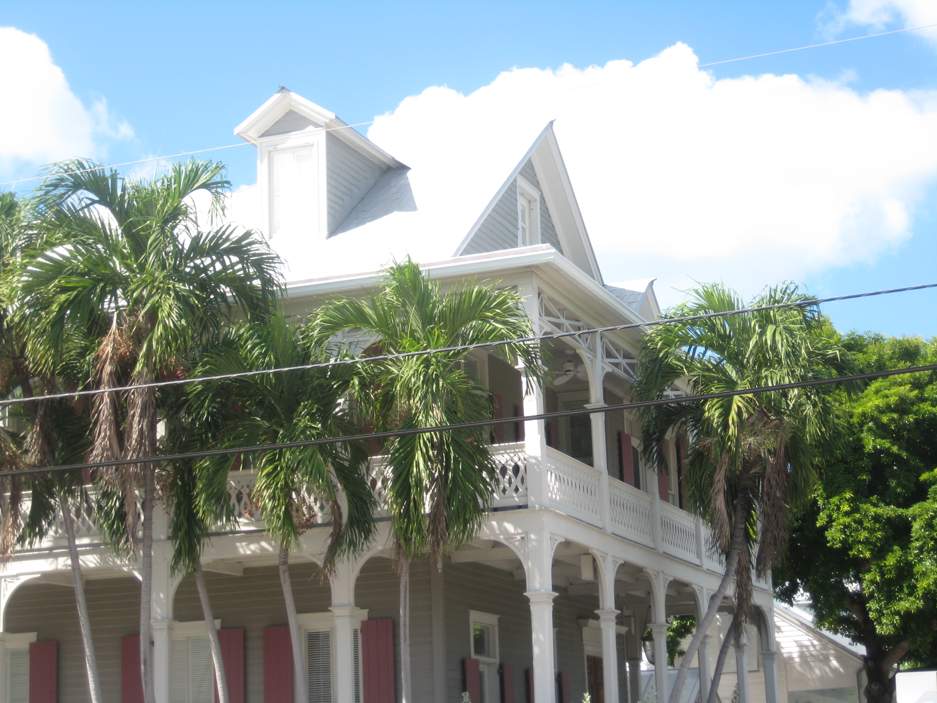 Gray house with Pink shutters Key West